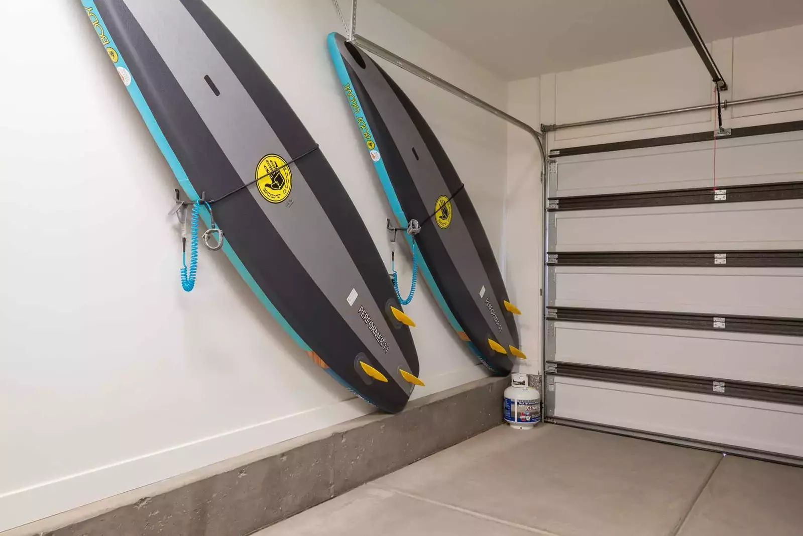 Garage With 2 Paddle Boards