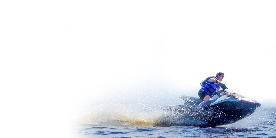 person riding jet ski