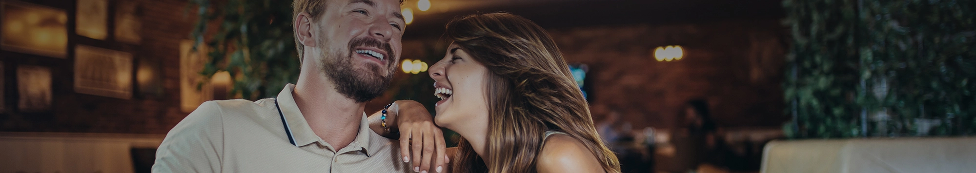 man and woman in restaurant