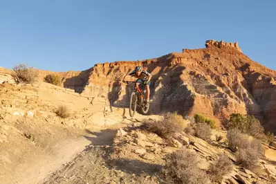 person biking at Gooseberry Mesa in Southern Utah