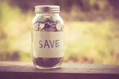 money jar with save written on it
