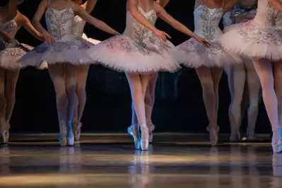 close up of ballet dancers