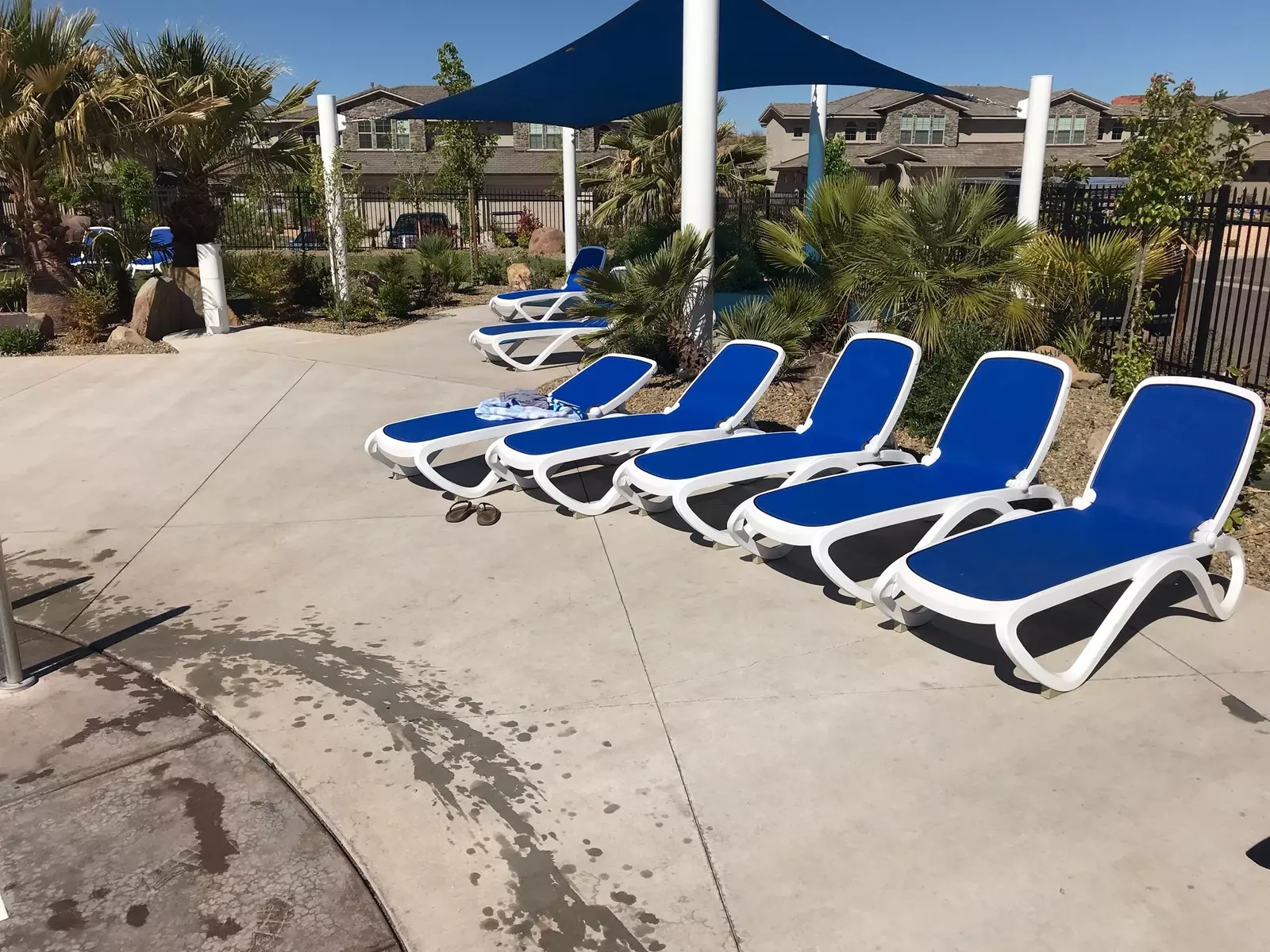Community Pool area with lounge chairs