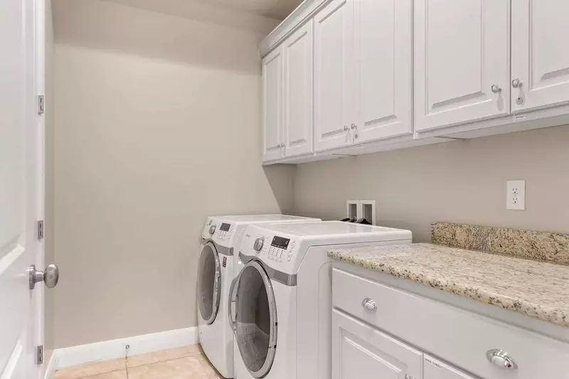 Laundry Room with Full Size Washer and Dryer