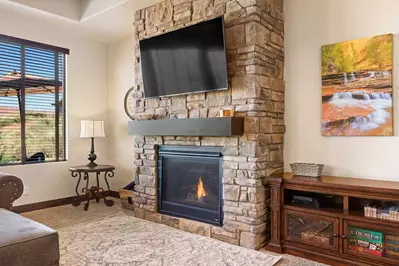 Living Room with TV and Fireplace