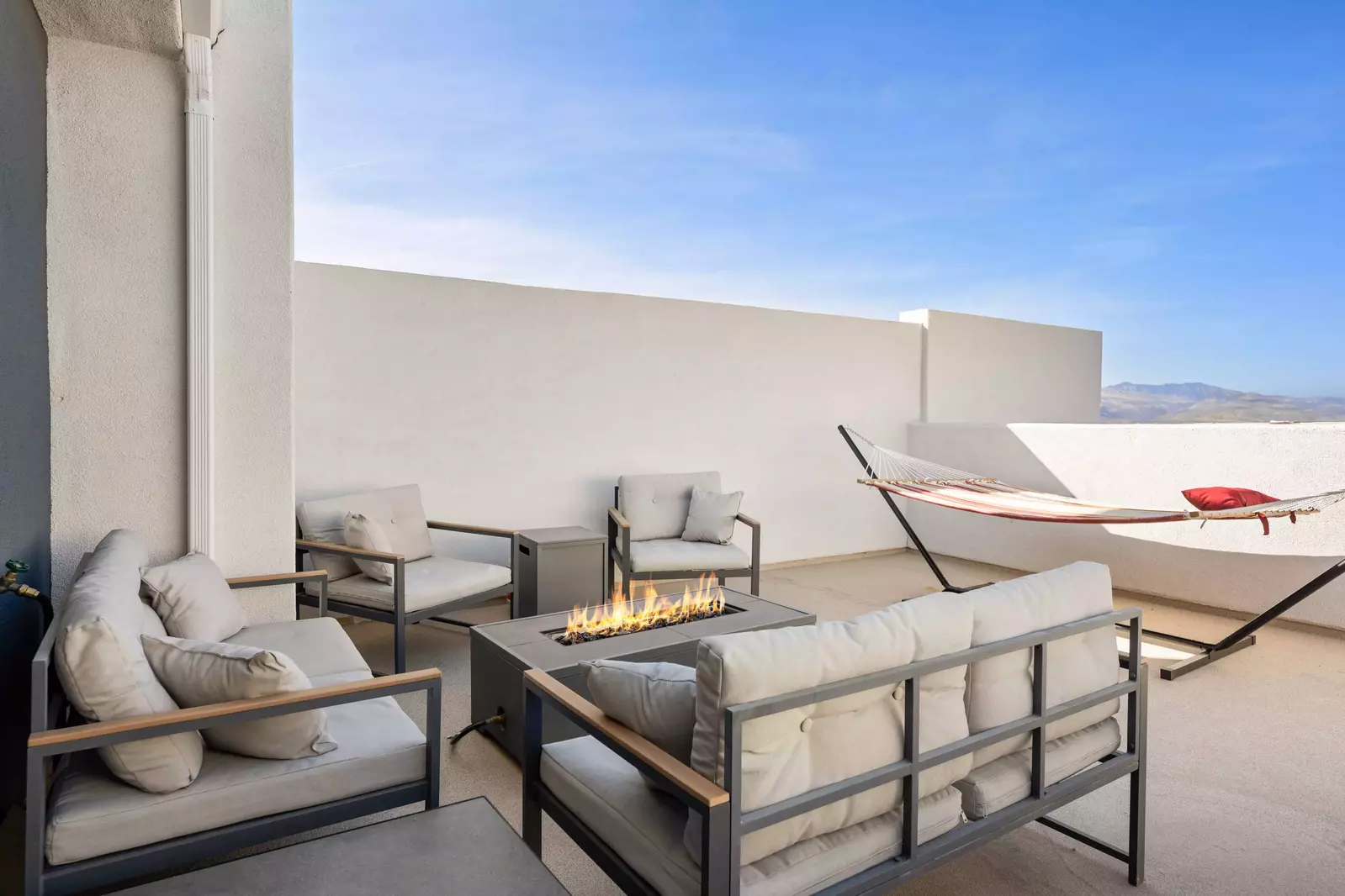 Rooftop Deck Seating with Fire Pit and Hammock