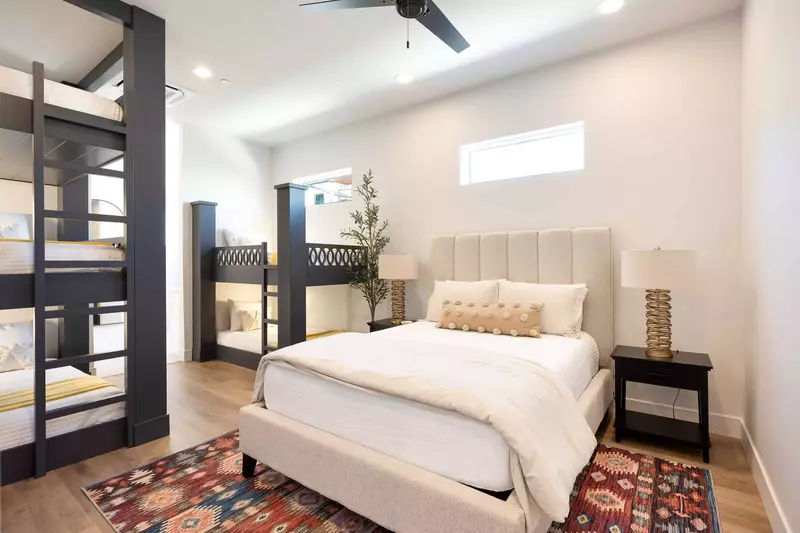 Queen Bedroom with Triple Twin Bunk Beds and Double Twin Bunk  with Attached Bath