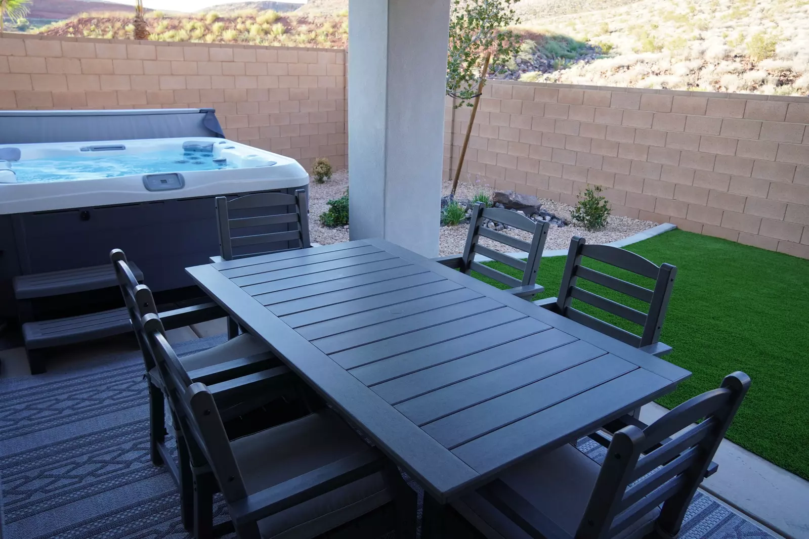 Covered Outdoor Patio Seating and Private Hot Tub