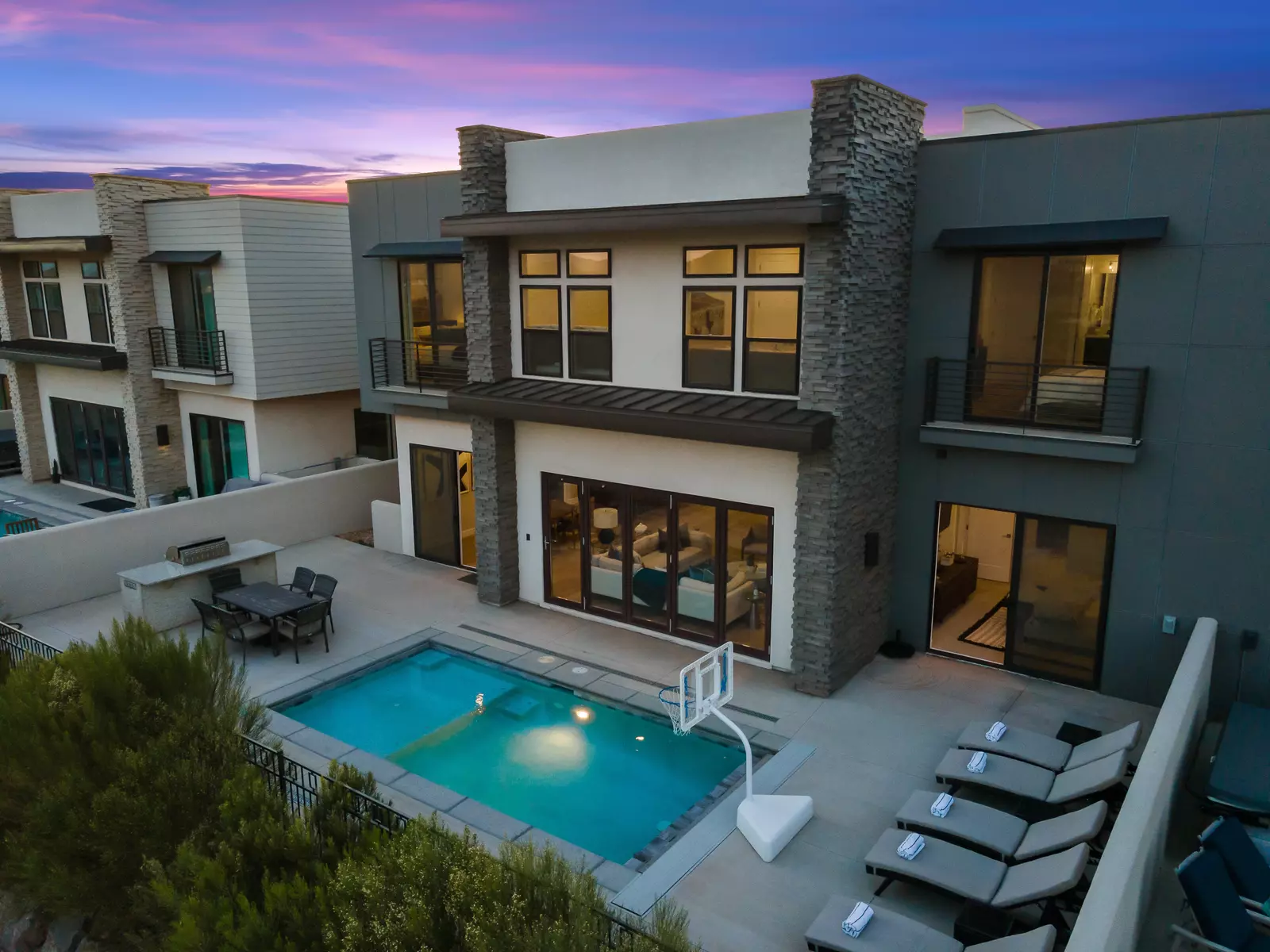 House 2: Exterior at Sunset