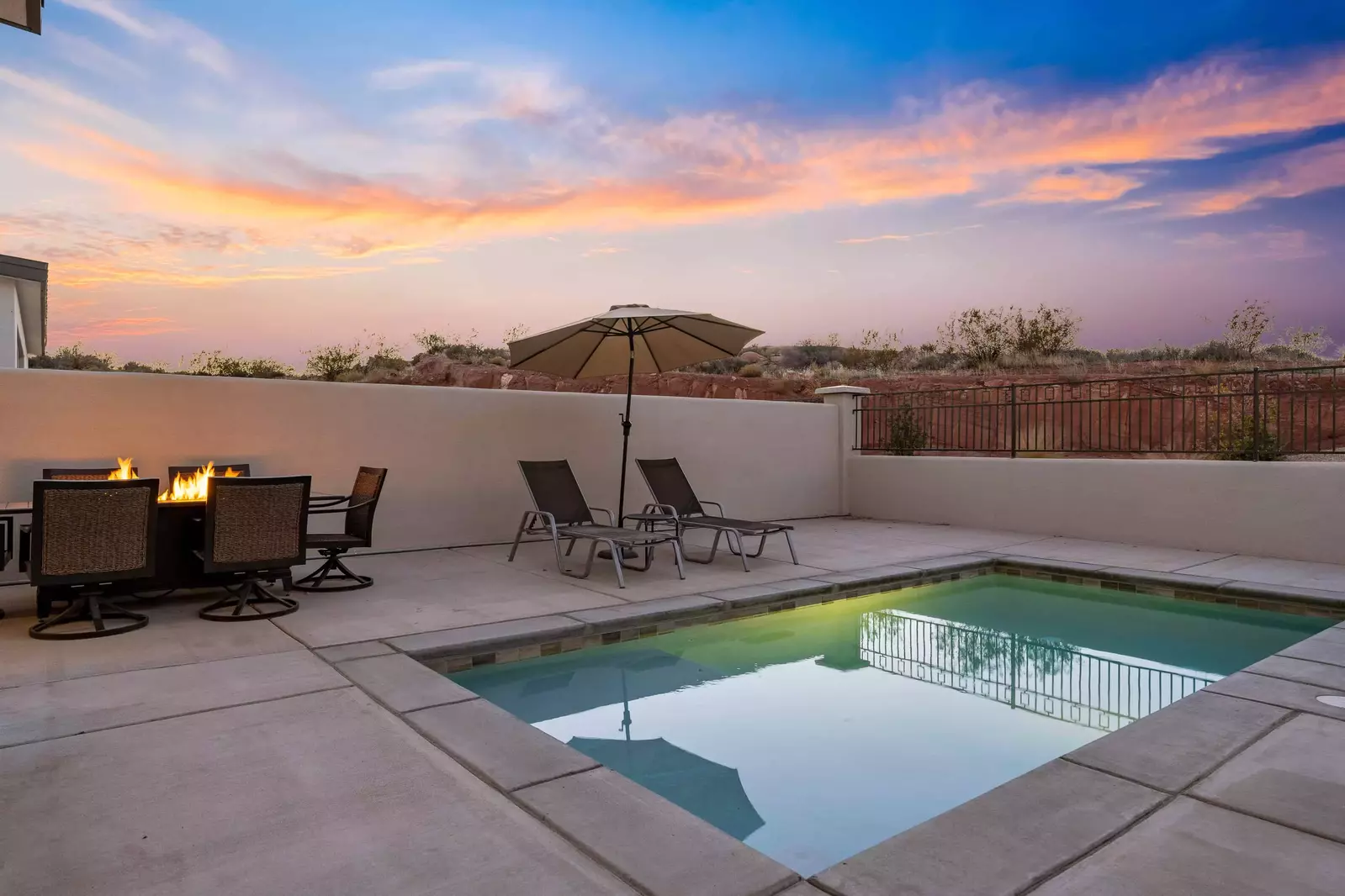 Patio With Private Pool, Tables, and Chairs