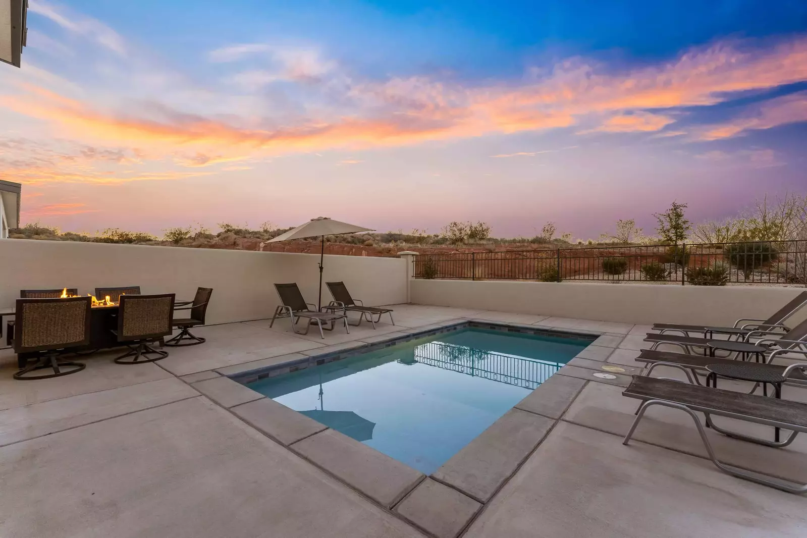 Patio With Private Pool, Tables, and Chairs