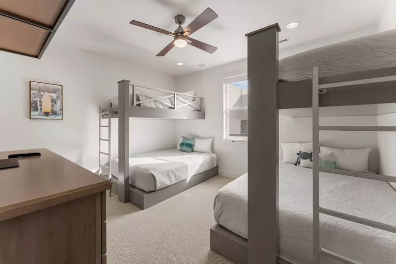 Your group will love this stylish bunk room with four comfortable beds, perfect for kids or friends sharing adventures together.
