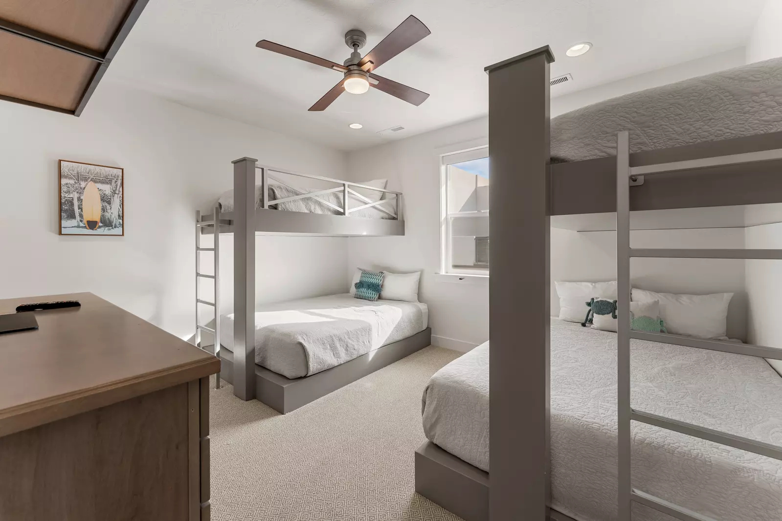 Your group will love this stylish bunk room with four comfortable beds, perfect for kids or friends sharing adventures together.