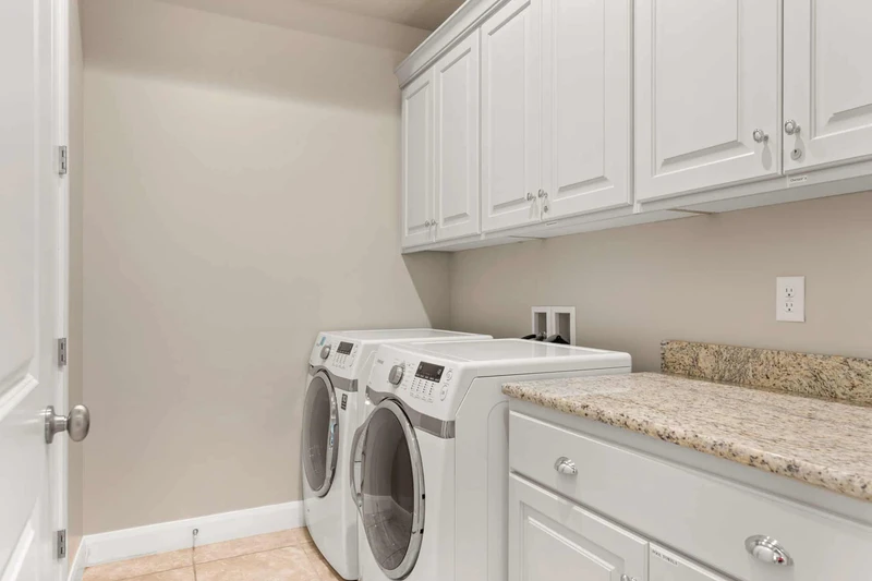 Laundry Room with Full Size Washer and Dryer