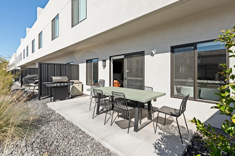Outdoor Patio with Dining Table and Grill