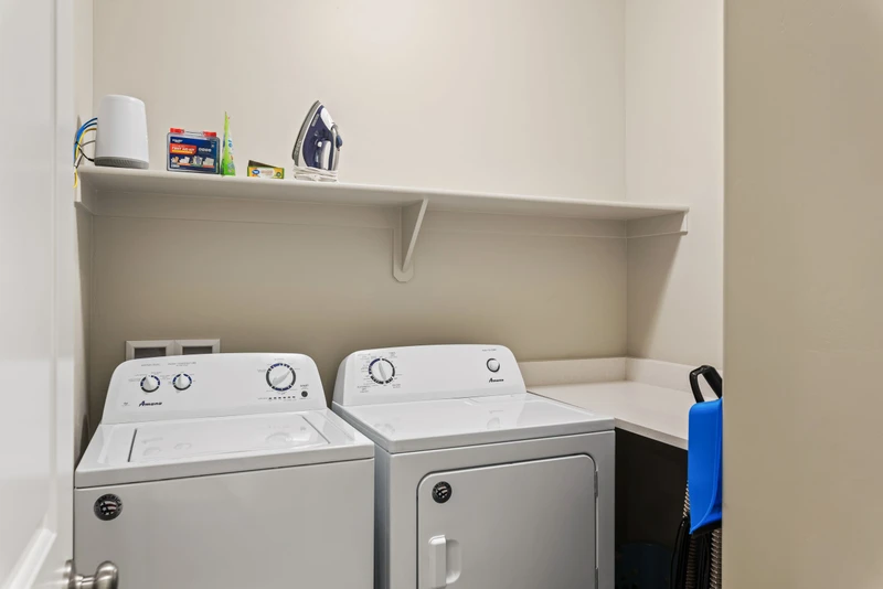 Laundry Area with Full Size Washer Dryer