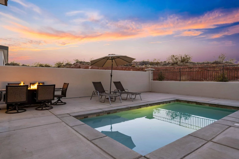 Patio With Private Pool, Tables, and Chairs