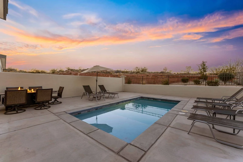 Patio With Private Pool, Tables, and Chairs