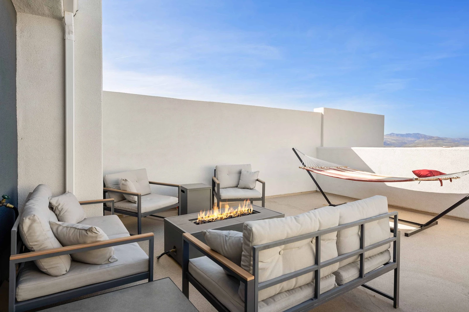 Rooftop Deck Seating with Fire Pit and Hammock