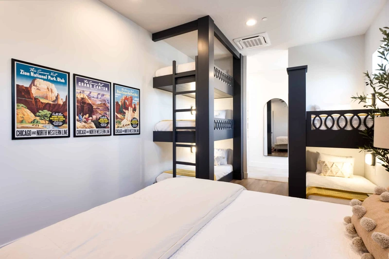 Queen Bedroom with Triple Twin Bunk Beds and Double Twin Bunk with Attached Bath