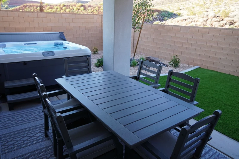 Covered Outdoor Patio Seating and Private Hot Tub