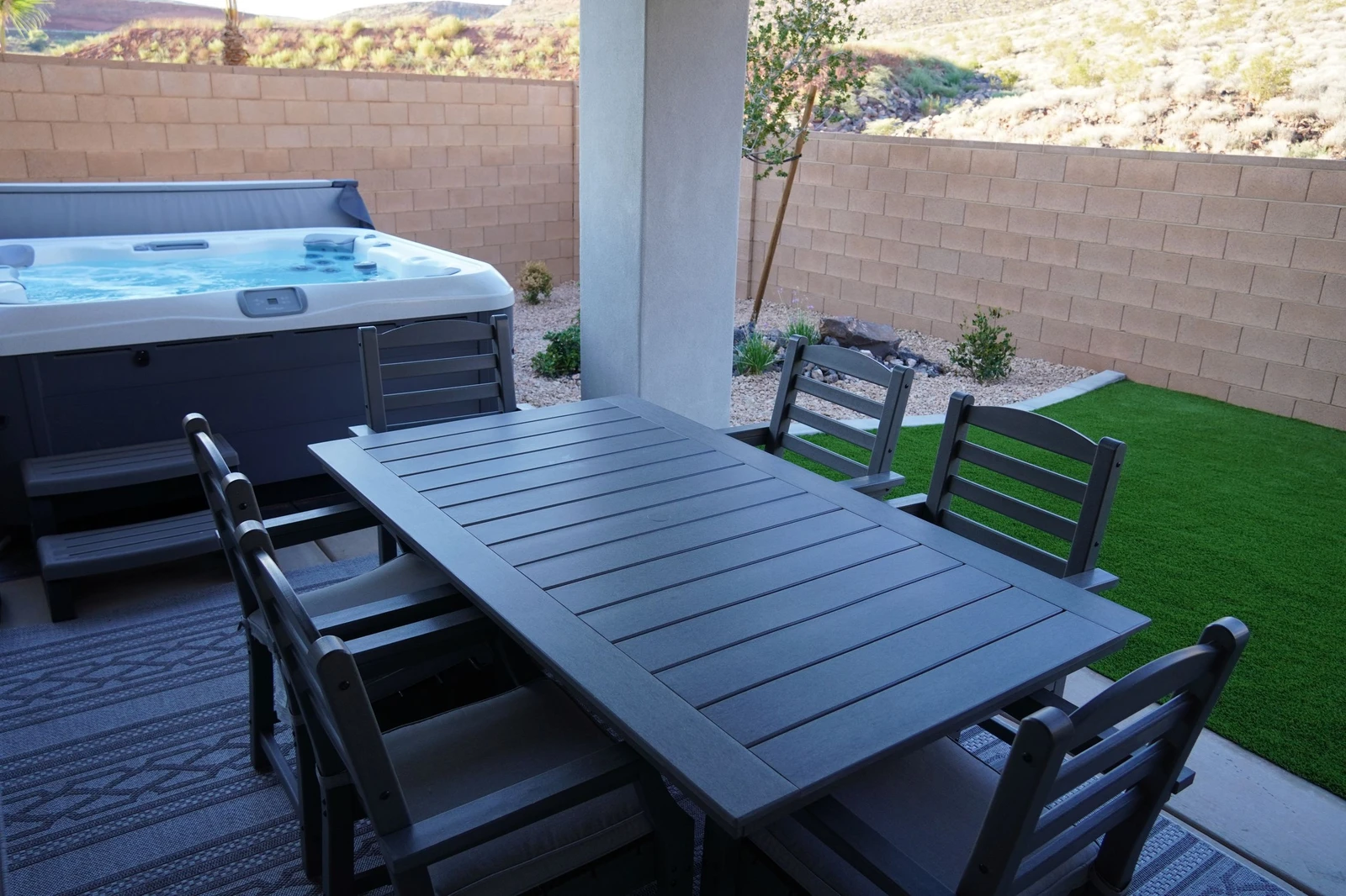Covered Outdoor Patio Seating and Private Hot Tub