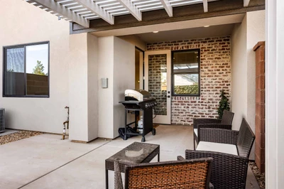 Back Patio Pergola Seating with BBQ Grill
