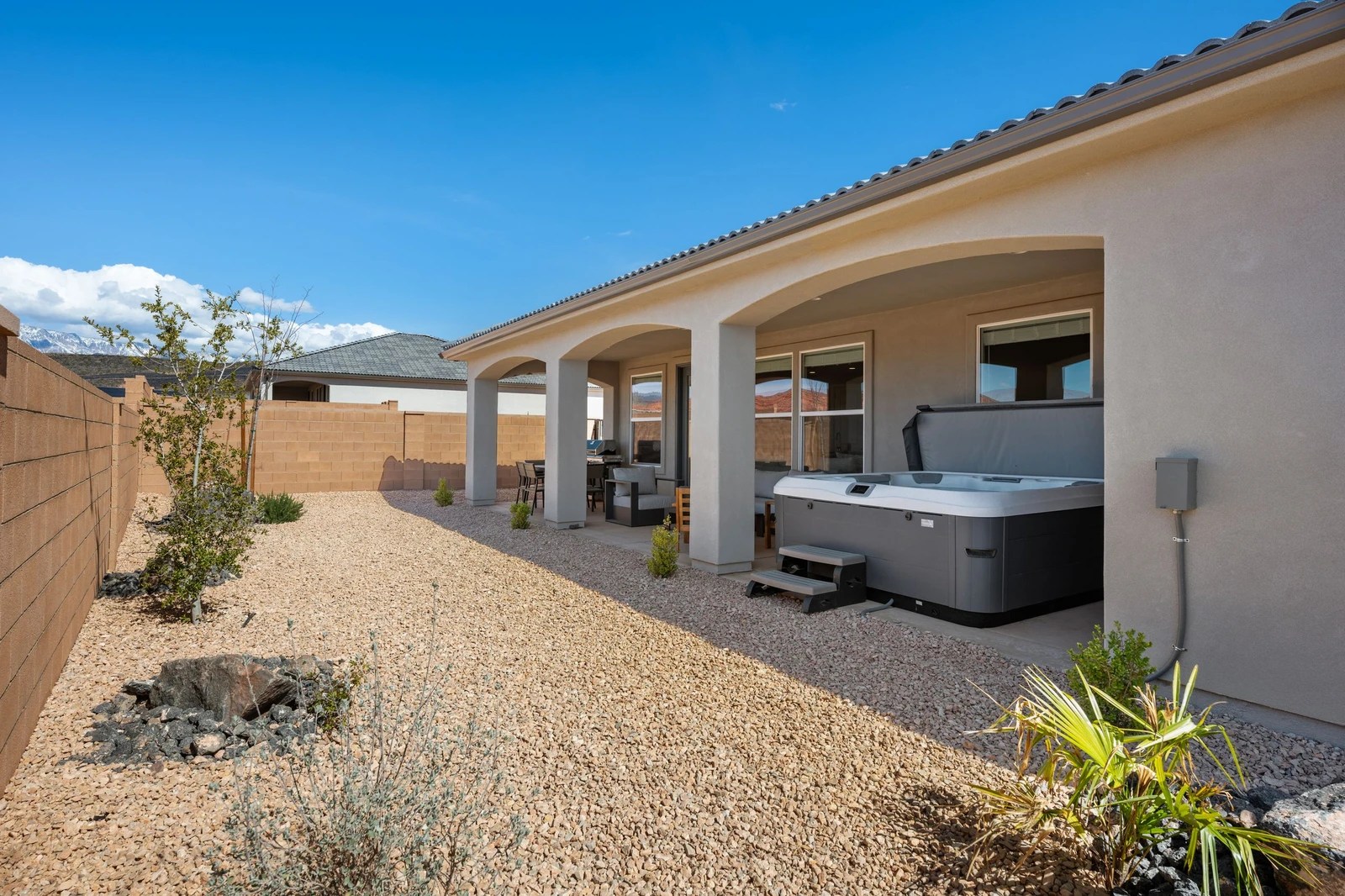 Covered Back Patio. Hot Tub + Grill