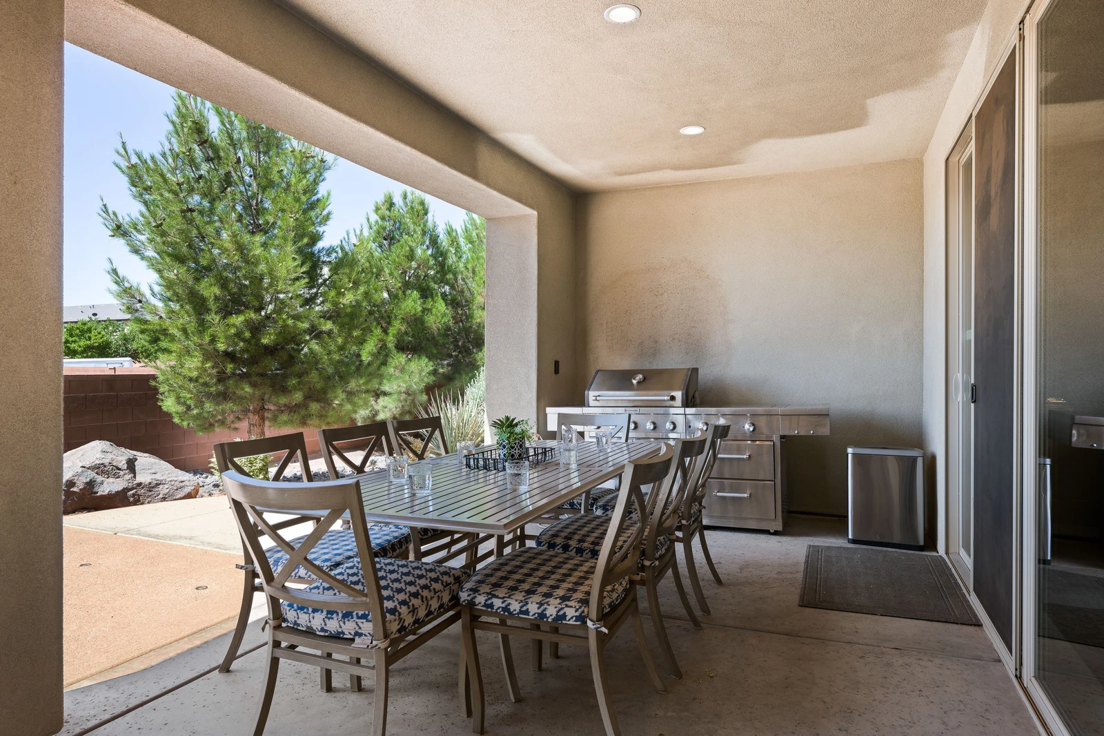 Covered Patio + Dining Table & Grill
